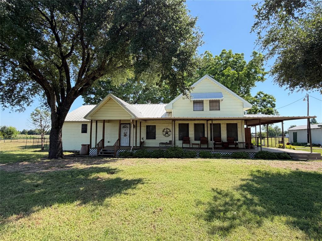 330 South Goode Road Wilmer, TX 75172 - Photo 1 of 38 a front view of a house with a yard