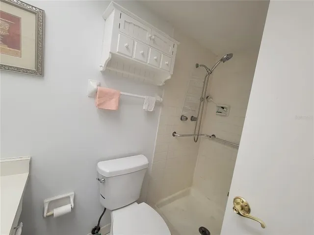 a view of a bathroom from a hallway
