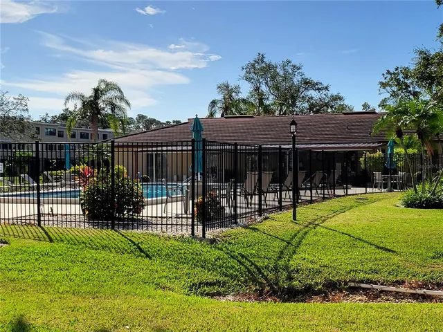 a garden view with a fountain