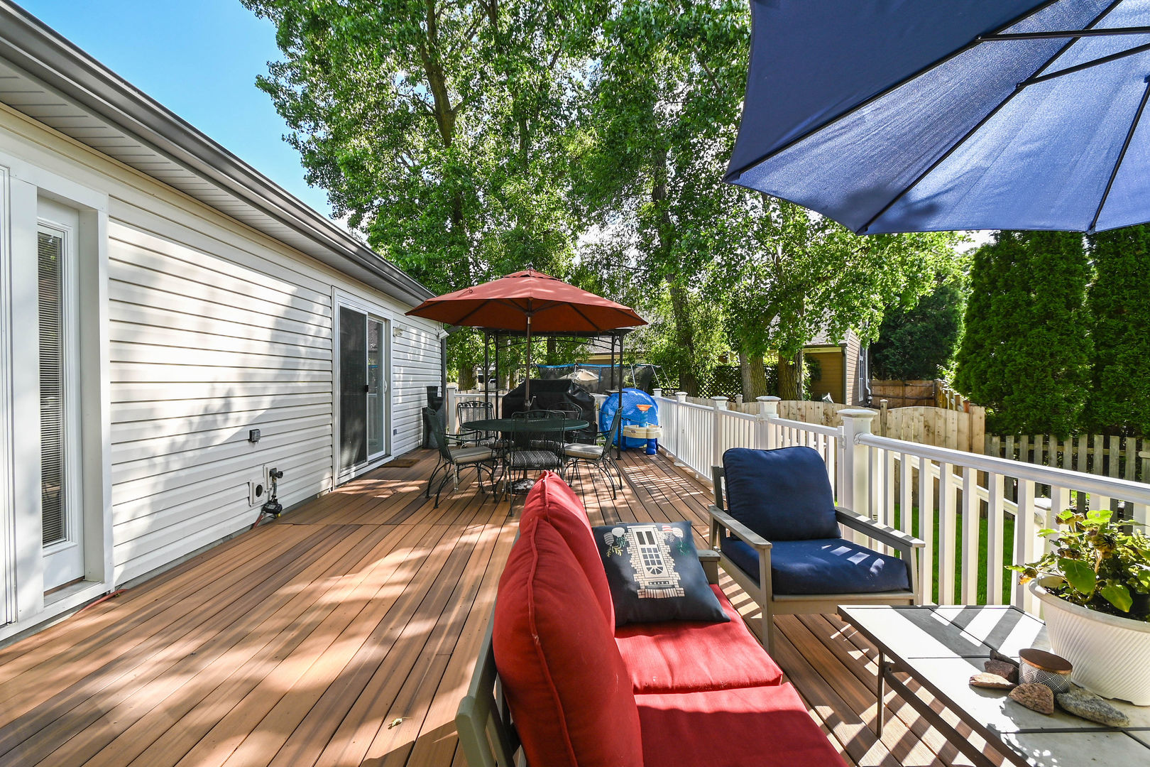 1333 Regency Lane Round Lake, IL 60073 - Photo 24 of 31 a view of balcony with wooden floor and outdoor seating