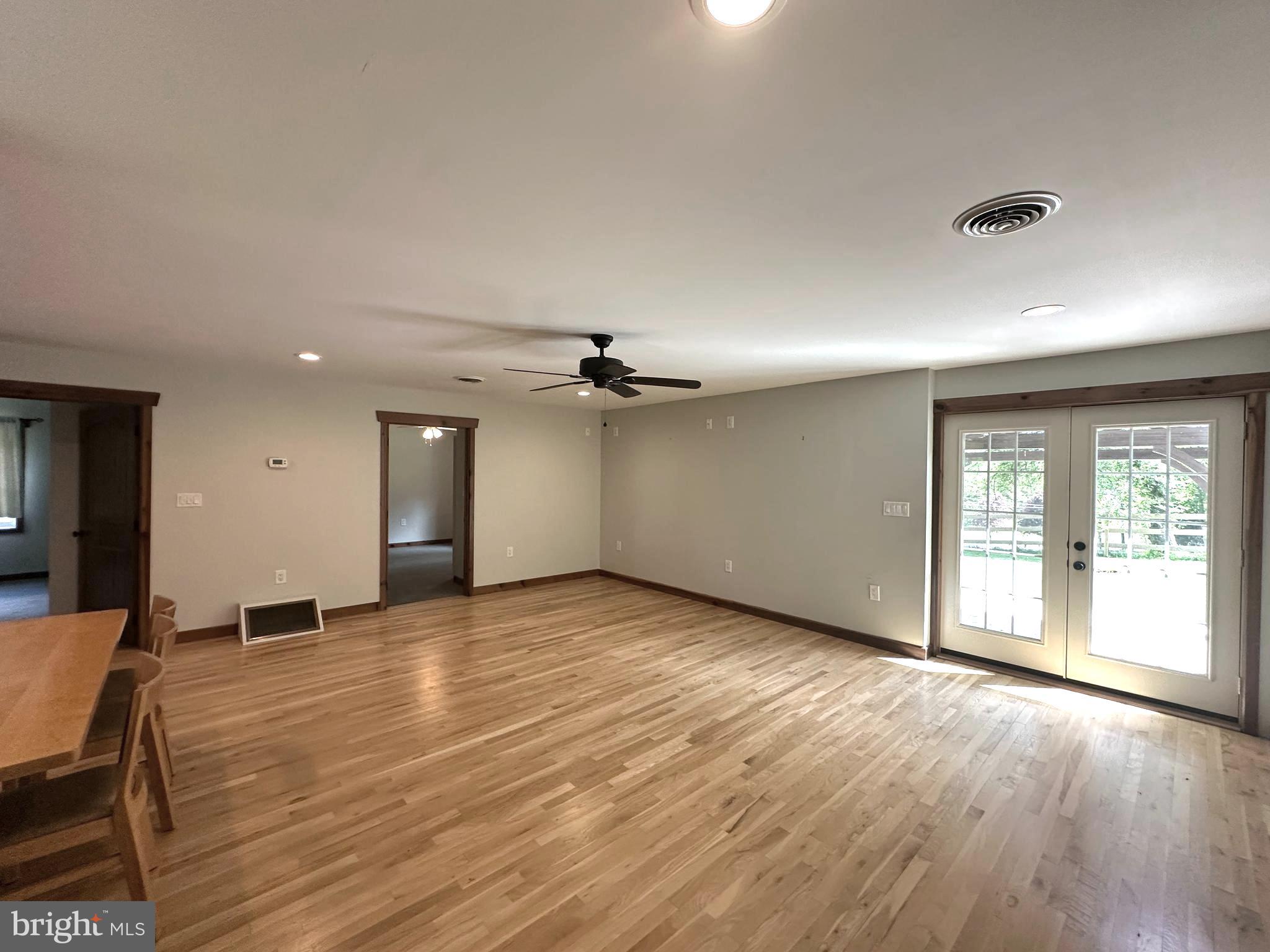 3720 Basford Road Frederick, MD 21703 - Photo 14 of 38 a view of a livingroom with a ceiling fan and window