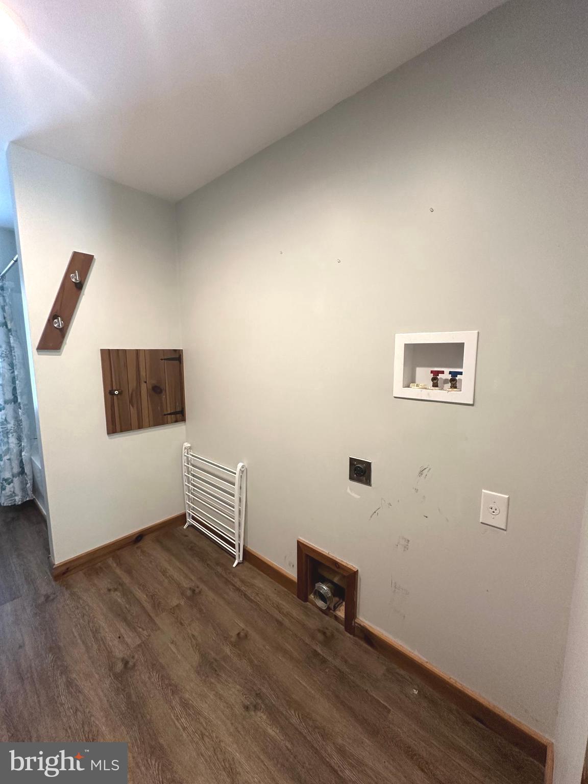 3720 Basford Road Frederick, MD 21703 - Photo 31 of 38 a room with wooden floor and white walls