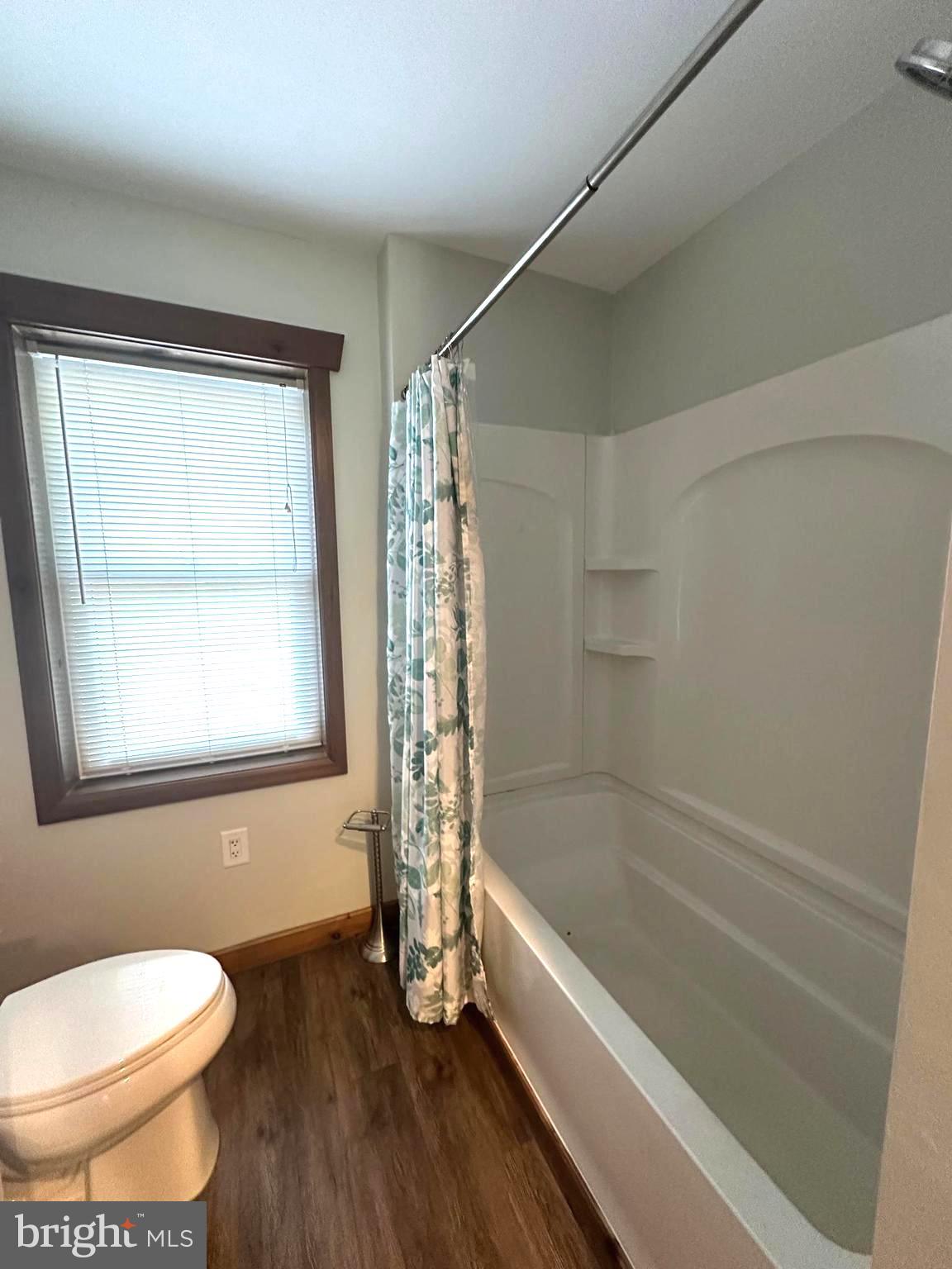 3720 Basford Road Frederick, MD 21703 - Photo 34 of 38 a bathroom with a toilet and a bathtub