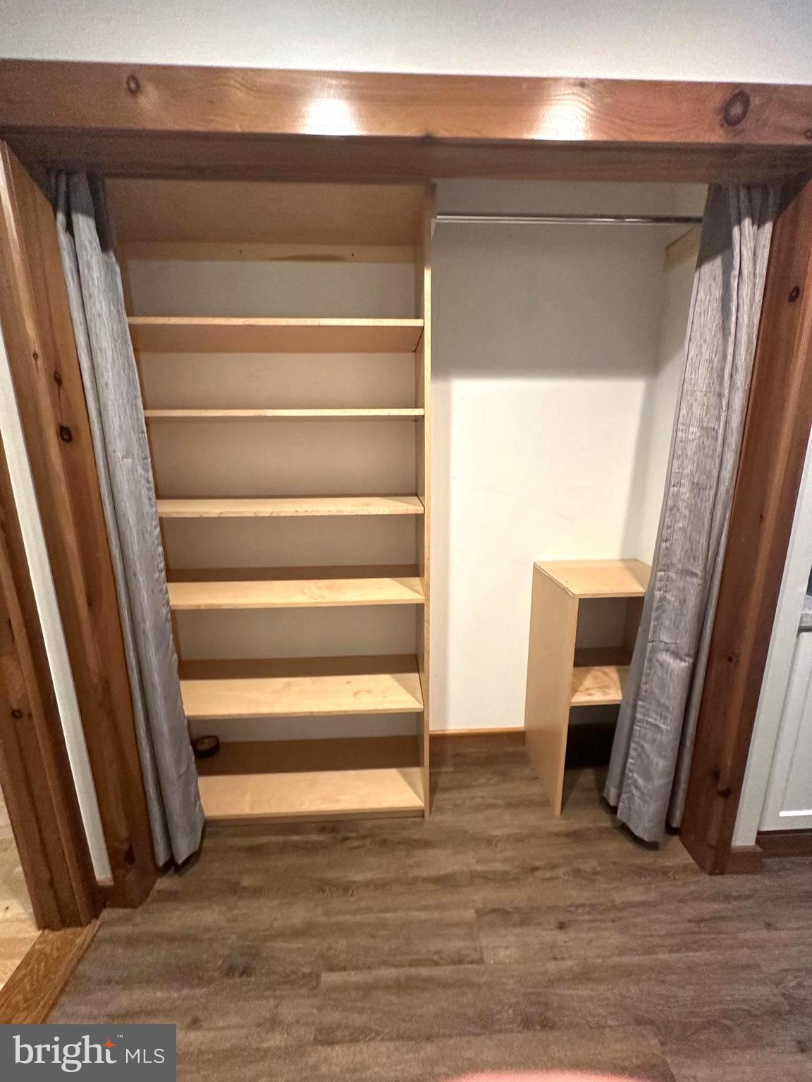 3720 Basford Road Frederick, MD 21703 - Photo 35 of 38 a view of walk in closet with chair and door