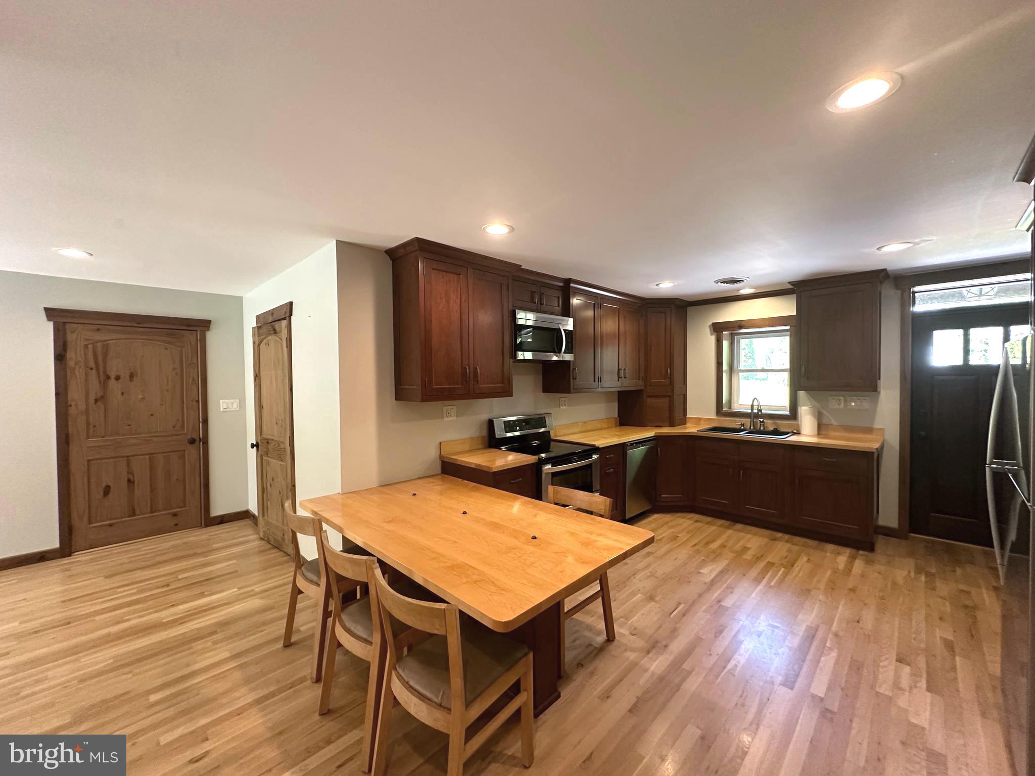 3720 Basford Road Frederick, MD 21703 - Photo 7 of 38 a living room with furniture and a wooden floor