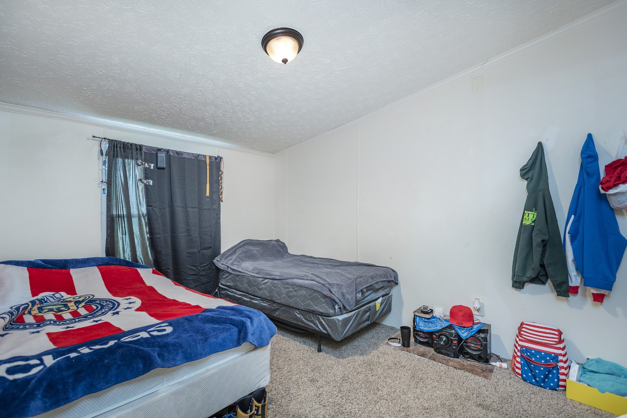 4936 Youngville Road Springfield, TN 37172 - Photo 13 of 20 a bedroom with two bed and a room