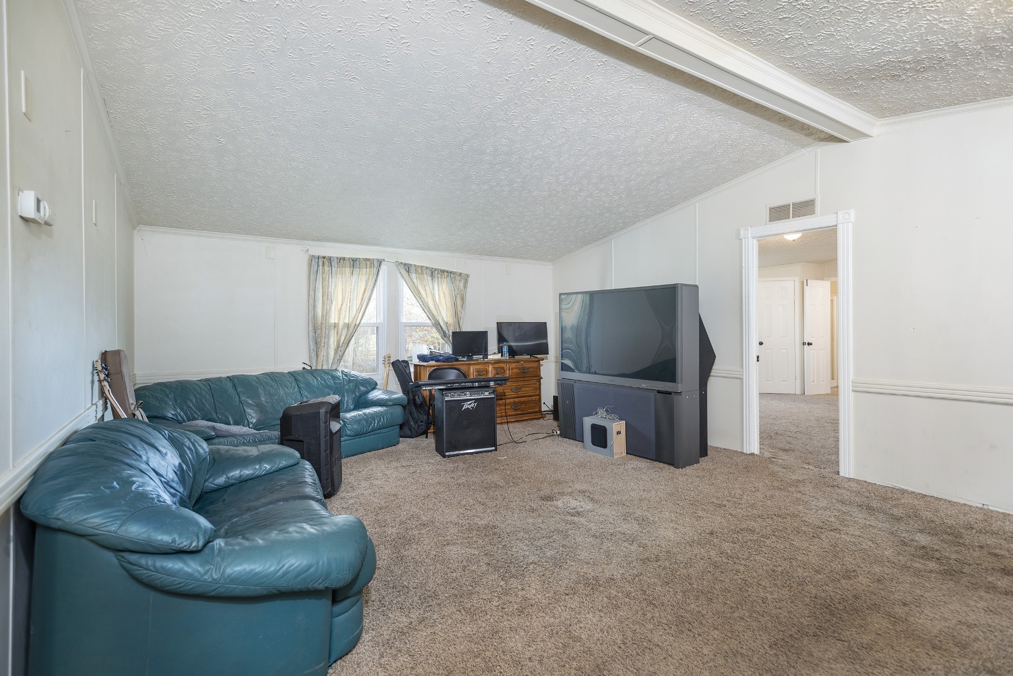 4936 Youngville Road Springfield, TN 37172 - Photo 3 of 20 a living room with furniture and a flat screen tv