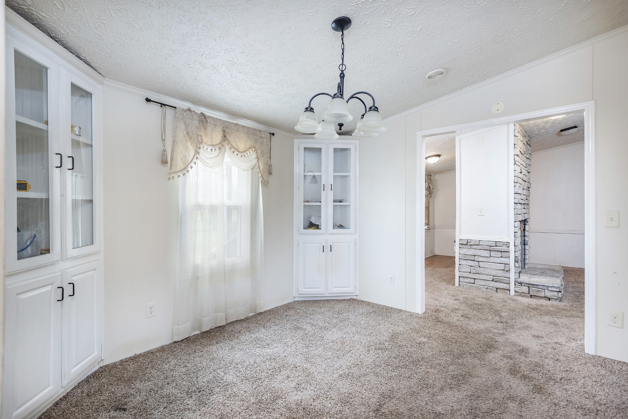 4936 Youngville Road Springfield, TN 37172 - Photo 4 of 20 a view of a hallway with chandelier and entryway