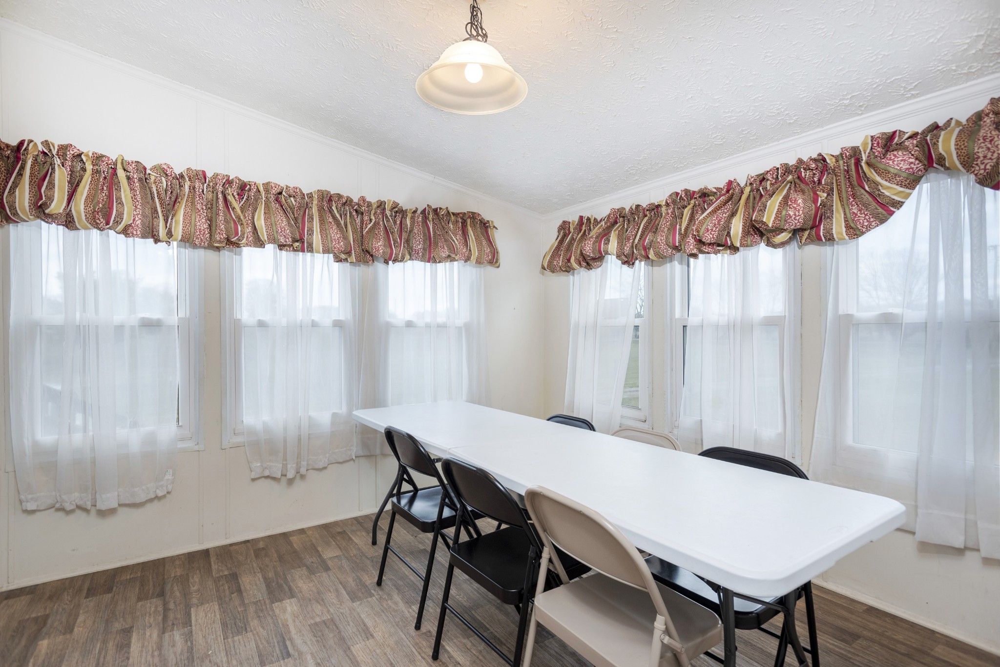 4936 Youngville Road Springfield, TN 37172 - Photo 8 of 20 a view of a dining room with furniture and a window