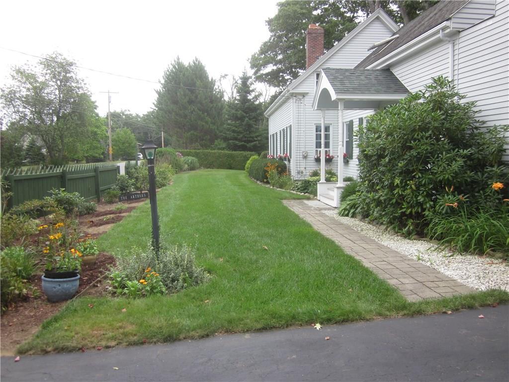 21 Fox Farm Road Biddeford, ME 04005 - Photo 5 of 35 The front yard has lush grass and...