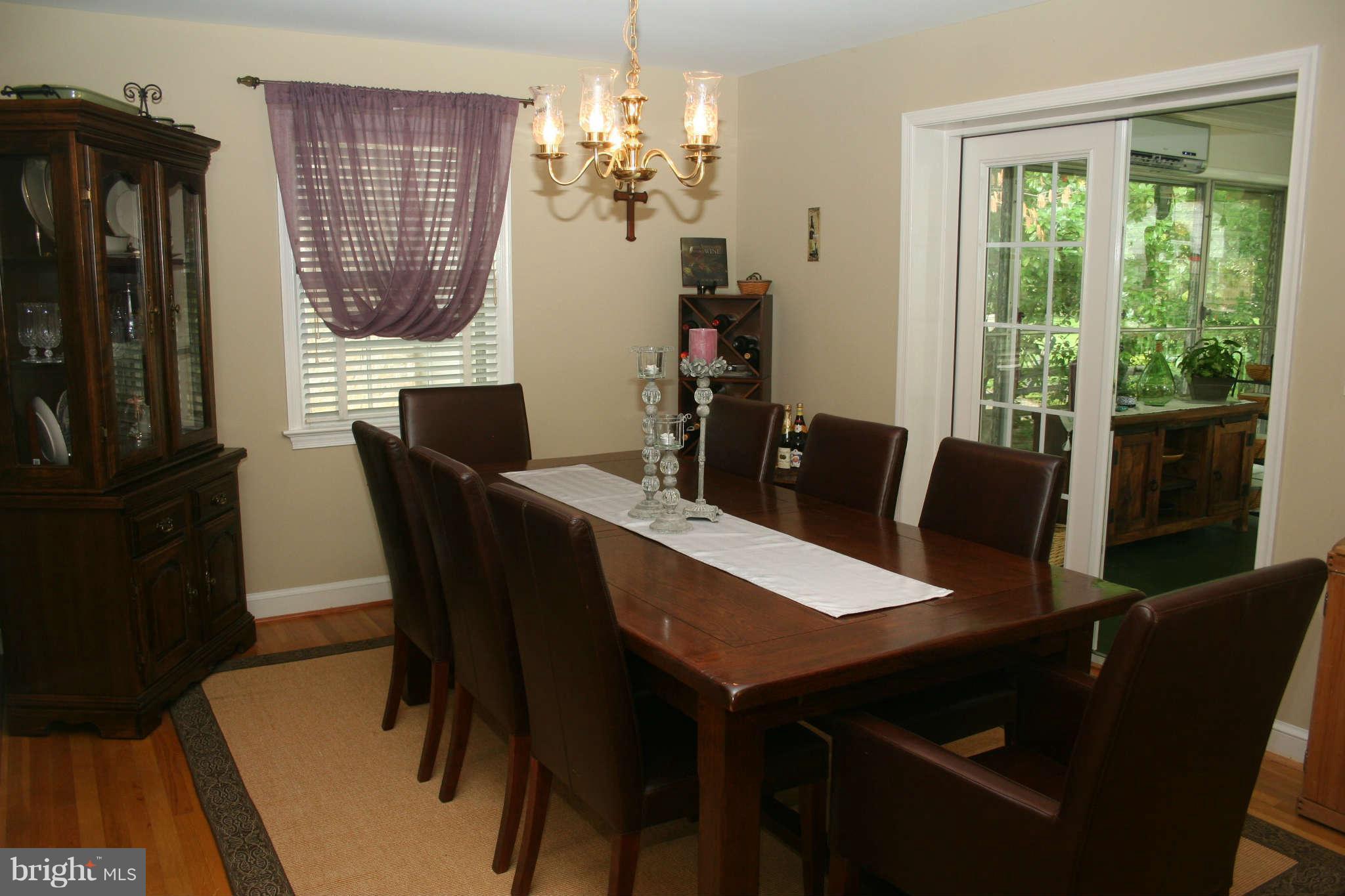 Dining Room with French Doors to Florida Room