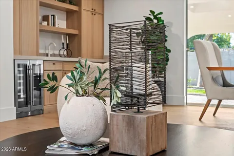 a view of kitchen with cabinet and electronic appliances
