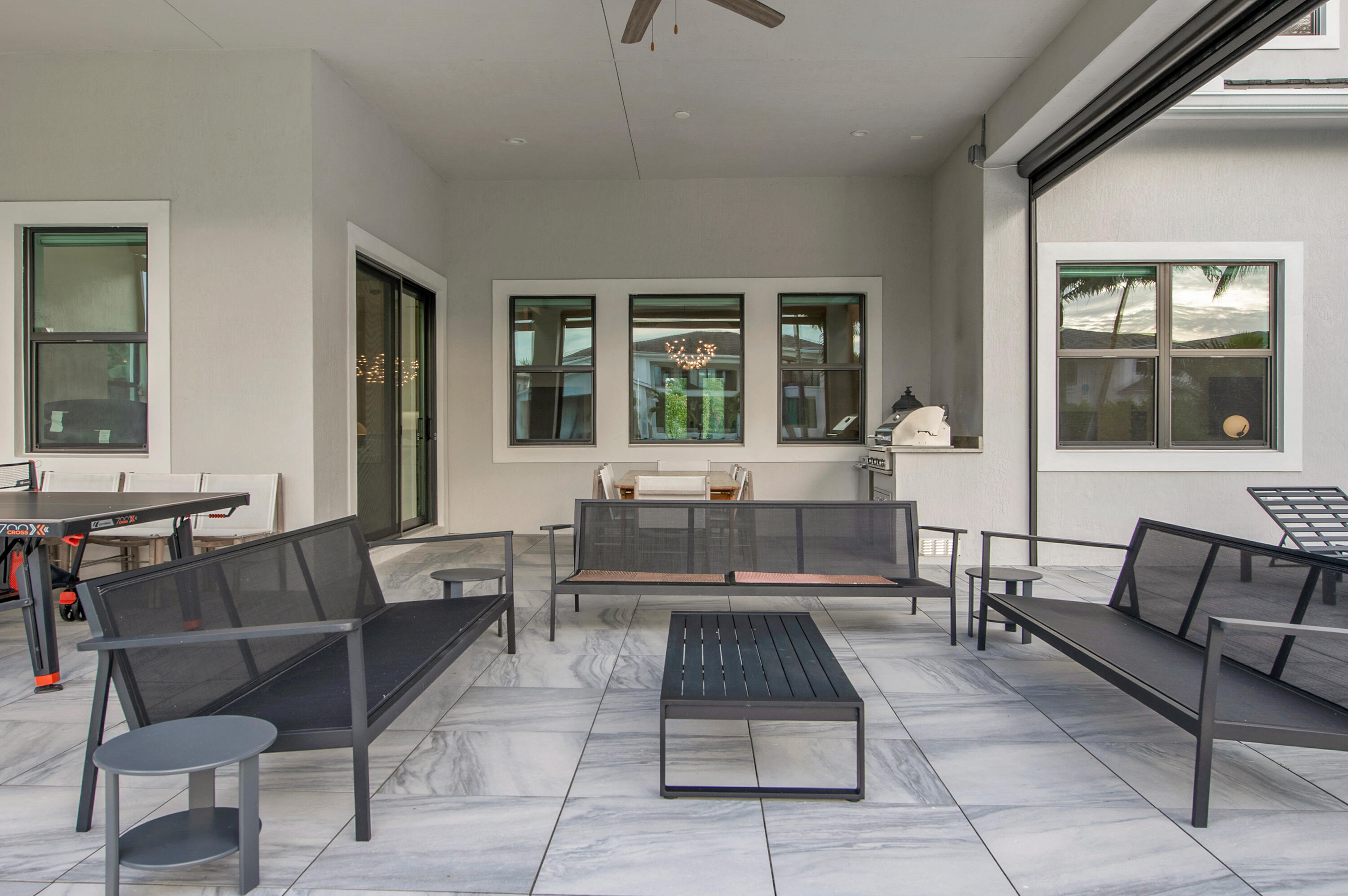 7480 Northwest 26th Way Boca Raton, FL 33496 - Photo 13 of 111 a living room with furniture and a large window