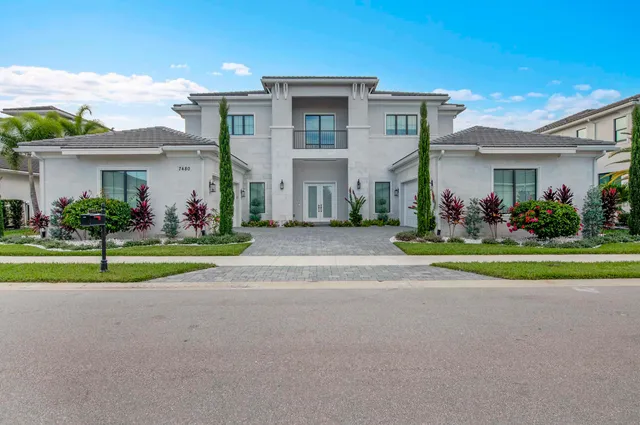 front view of a house with a yard