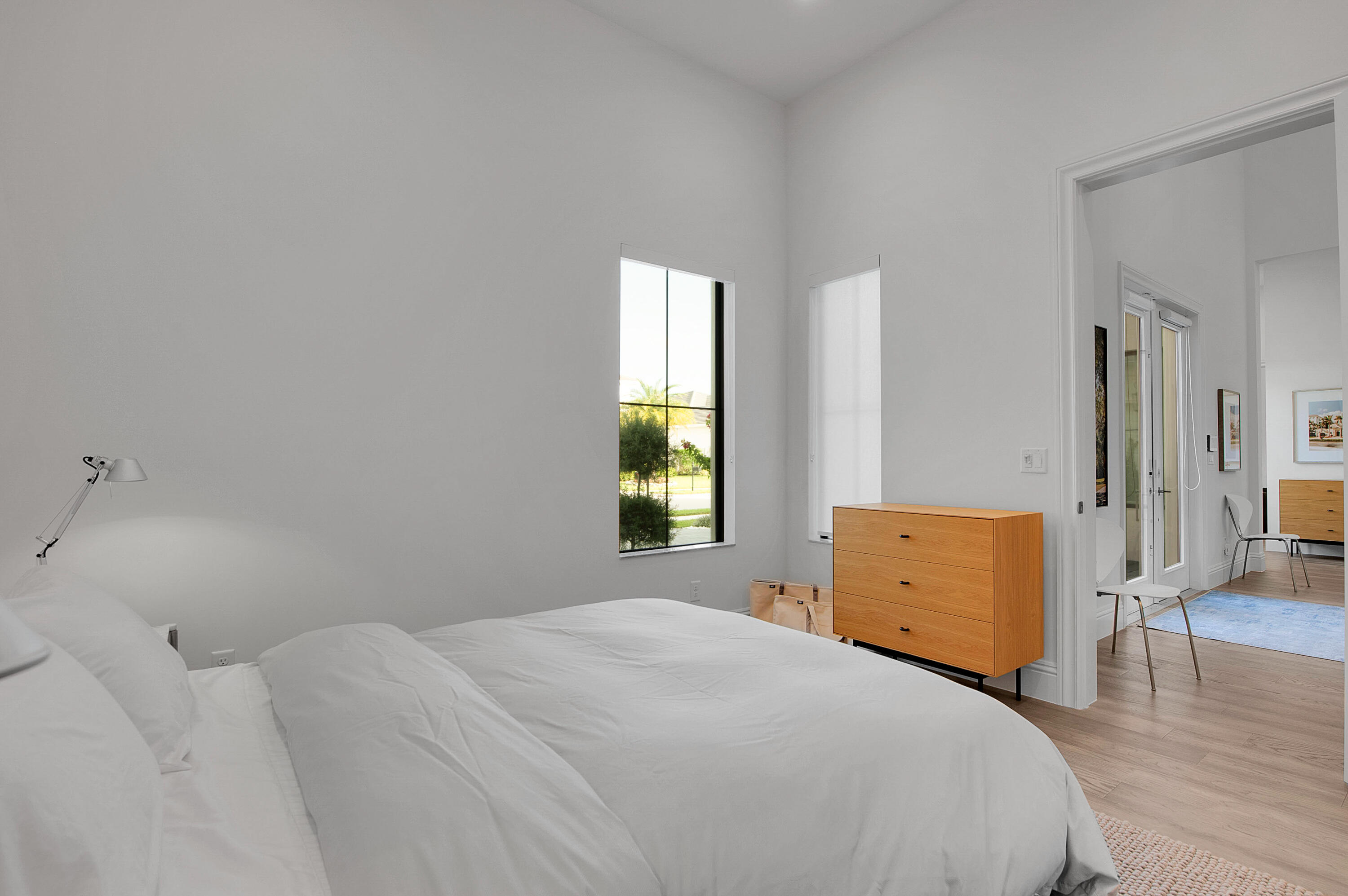 7480 Northwest 26th Way Boca Raton, FL 33496 - Photo 22 of 111 a bedroom with a bed and a window