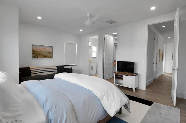 a living room with furniture and windows