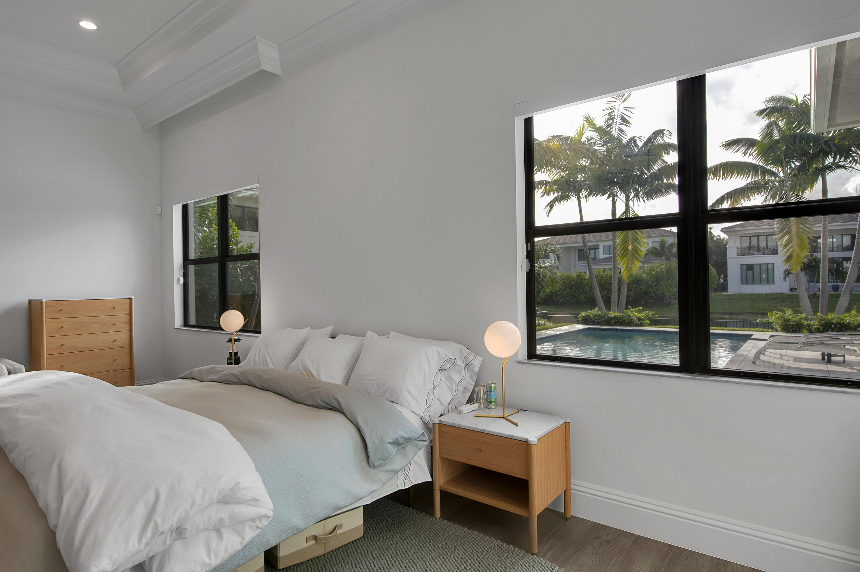 7480 Northwest 26th Way Boca Raton, FL 33496 - Photo 53 of 111 a bedroom with a bed and a window