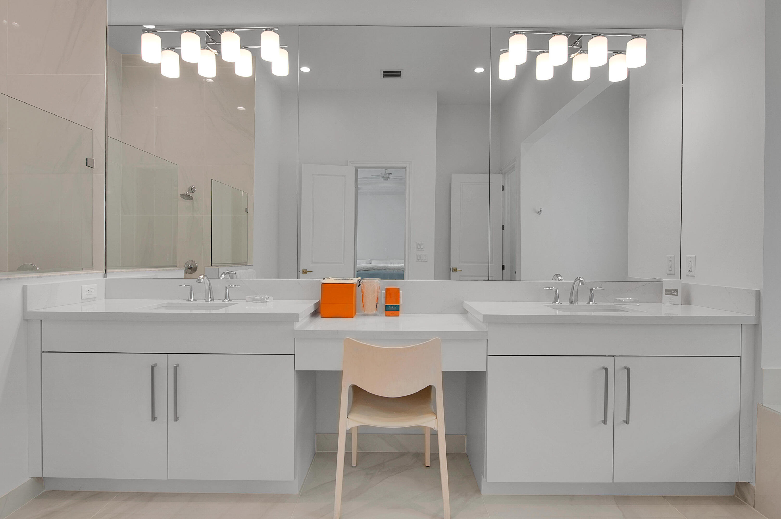 7480 Northwest 26th Way Boca Raton, FL 33496 - Photo 61 of 111 a bathroom with a sink and a mirror