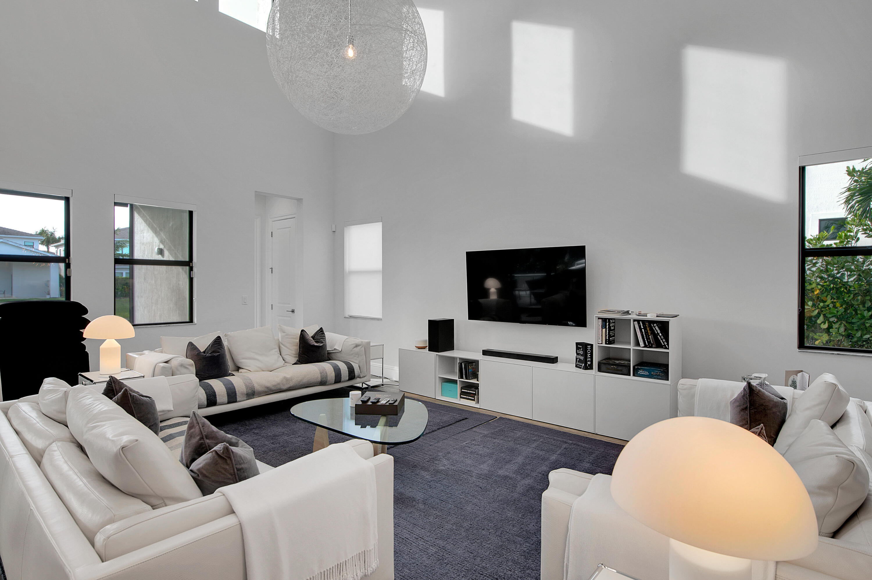 7480 Northwest 26th Way Boca Raton, FL 33496 - Photo 83 of 111 a living room with furniture and a flat screen tv