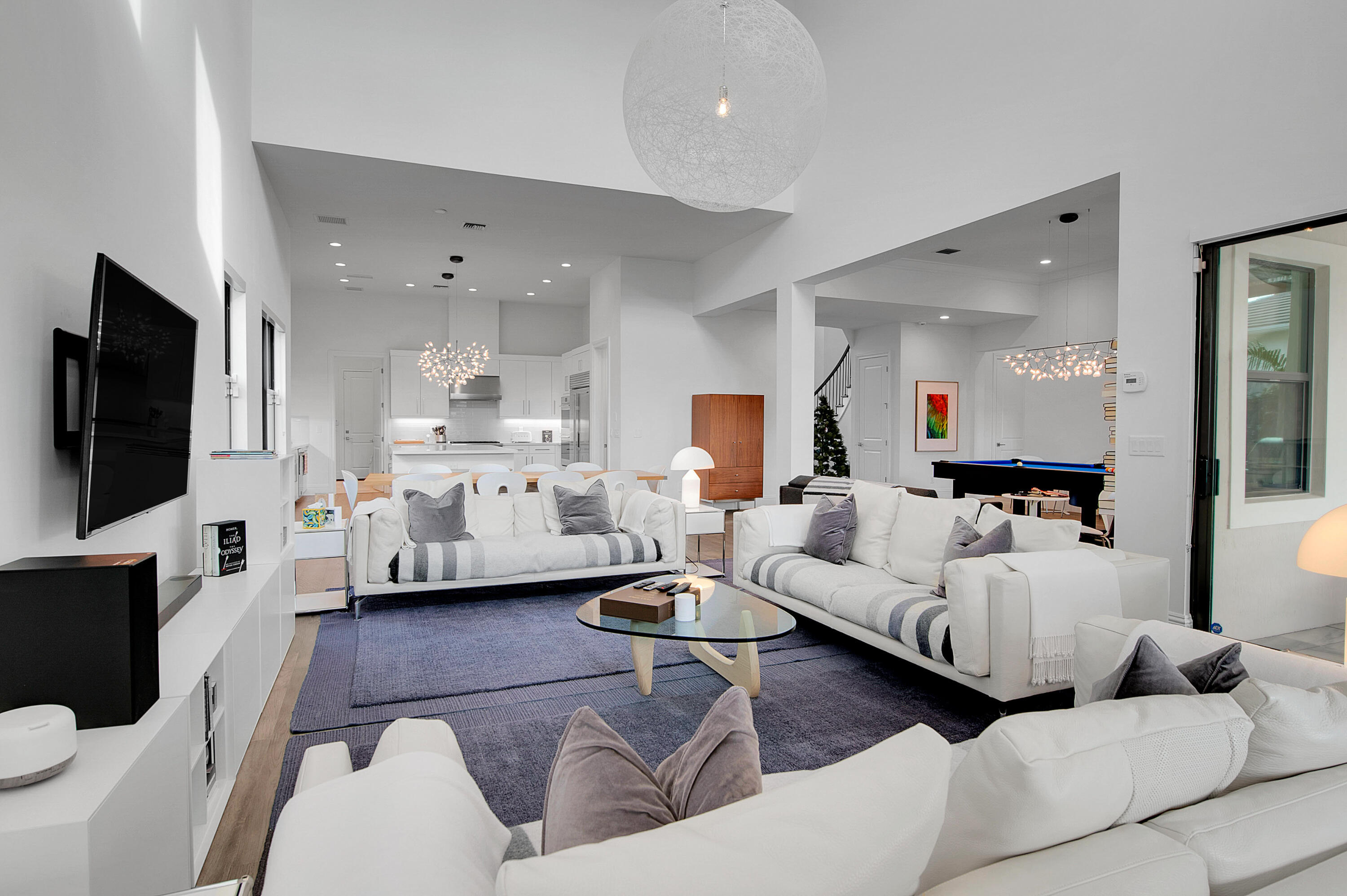 7480 Northwest 26th Way Boca Raton, FL 33496 - Photo 85 of 111 a living room with furniture and a flat screen tv