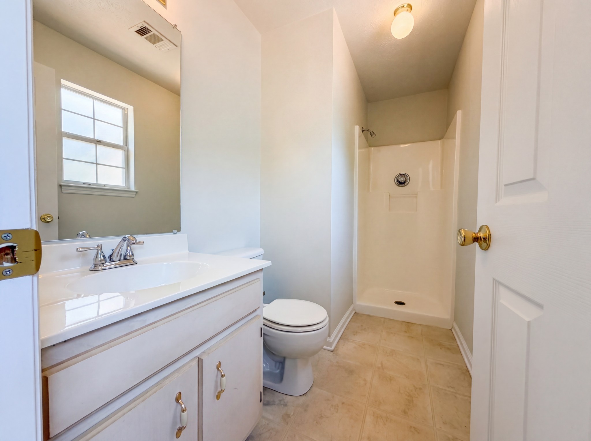 609 Sandy Spring Trail Madison, TN 37115 - Photo 13 of 16 a bathroom with a granite countertop sink a toilet and a mirror