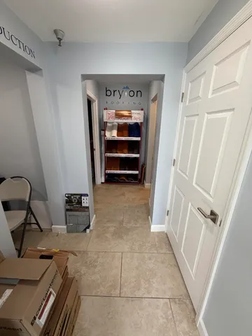 a view of room with furniture and closet