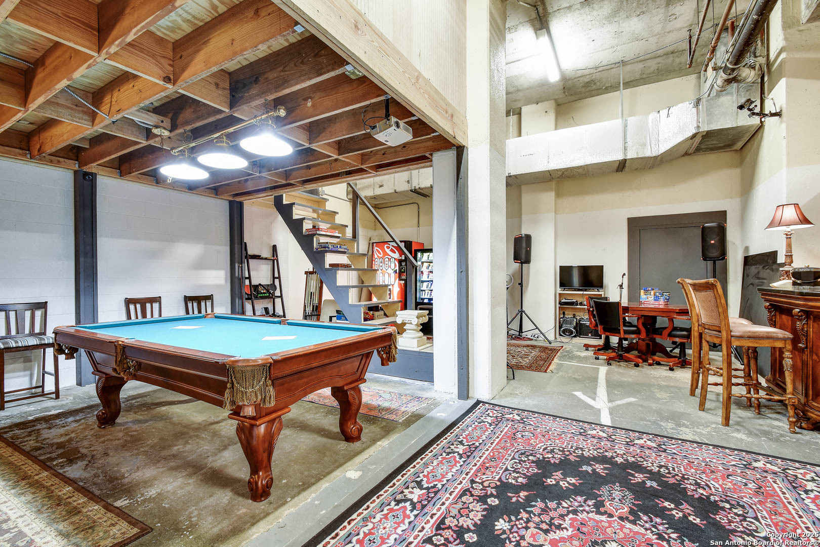 7701 Wurzbach Road, Unit 405 San Antonio, TX 78229 - Photo 26 of 42 a living room with furniture pool table table and chairs