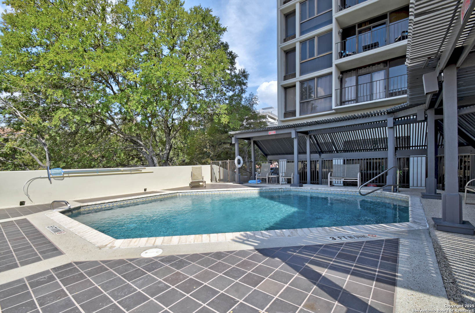 7701 Wurzbach Road, Unit 405 San Antonio, TX 78229 - Photo 34 of 42 a view of a building with a outdoor space