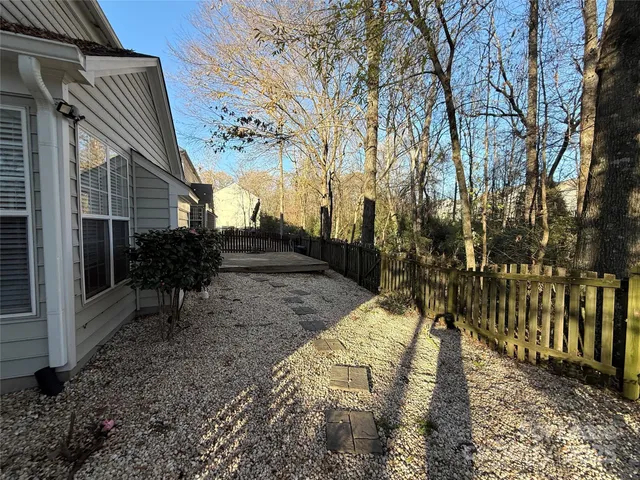 a view of a pathway with a yard