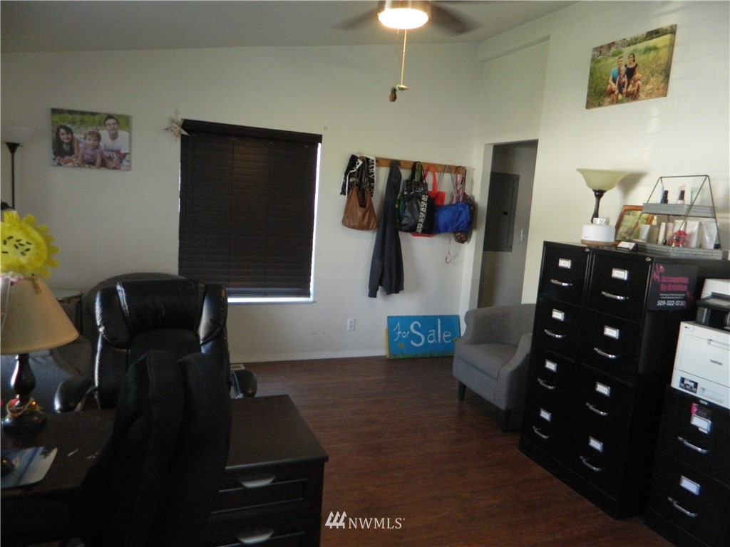 41 Miller Road Omak, WA 98841 - Photo 16 of 27 a bedroom with a bed and a television in it