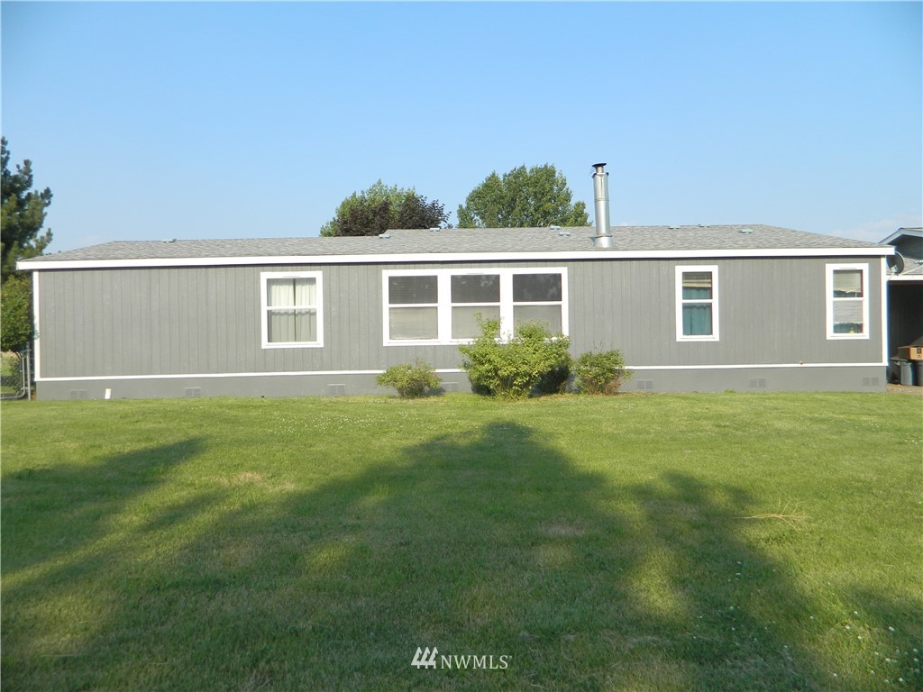 41 Miller Road Omak, WA 98841 - Photo 3 of 27 a front view of house with yard and green space