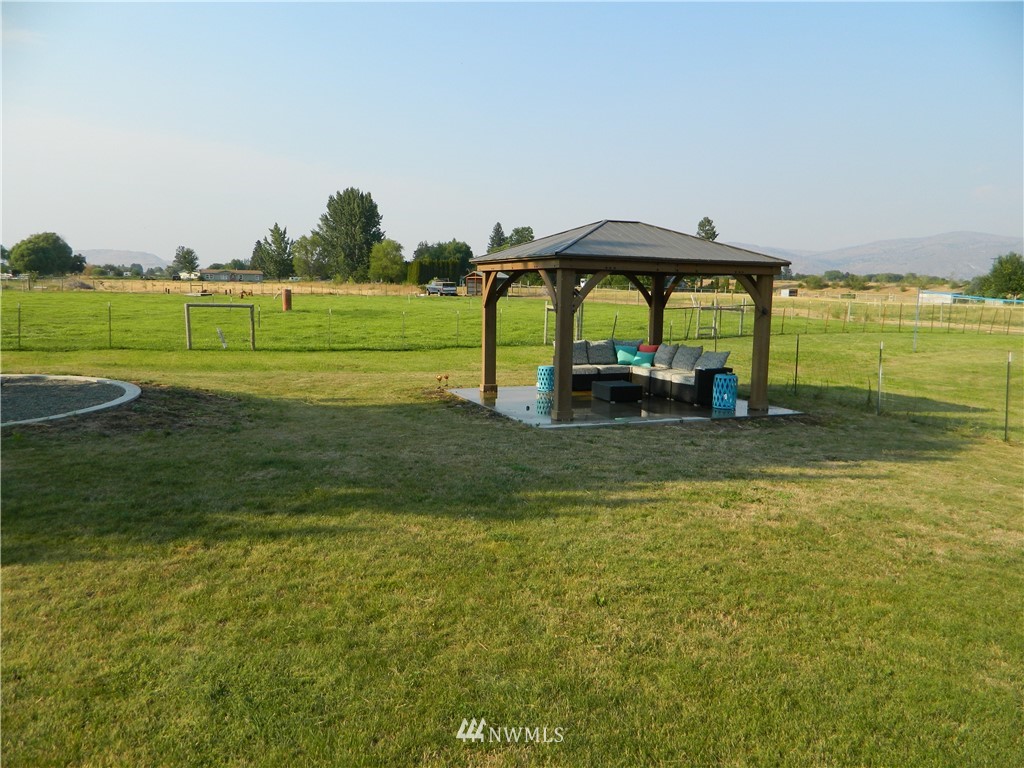 41 Miller Road Omak, WA 98841 - Photo 10 of 27 a view of a golf course with a lake