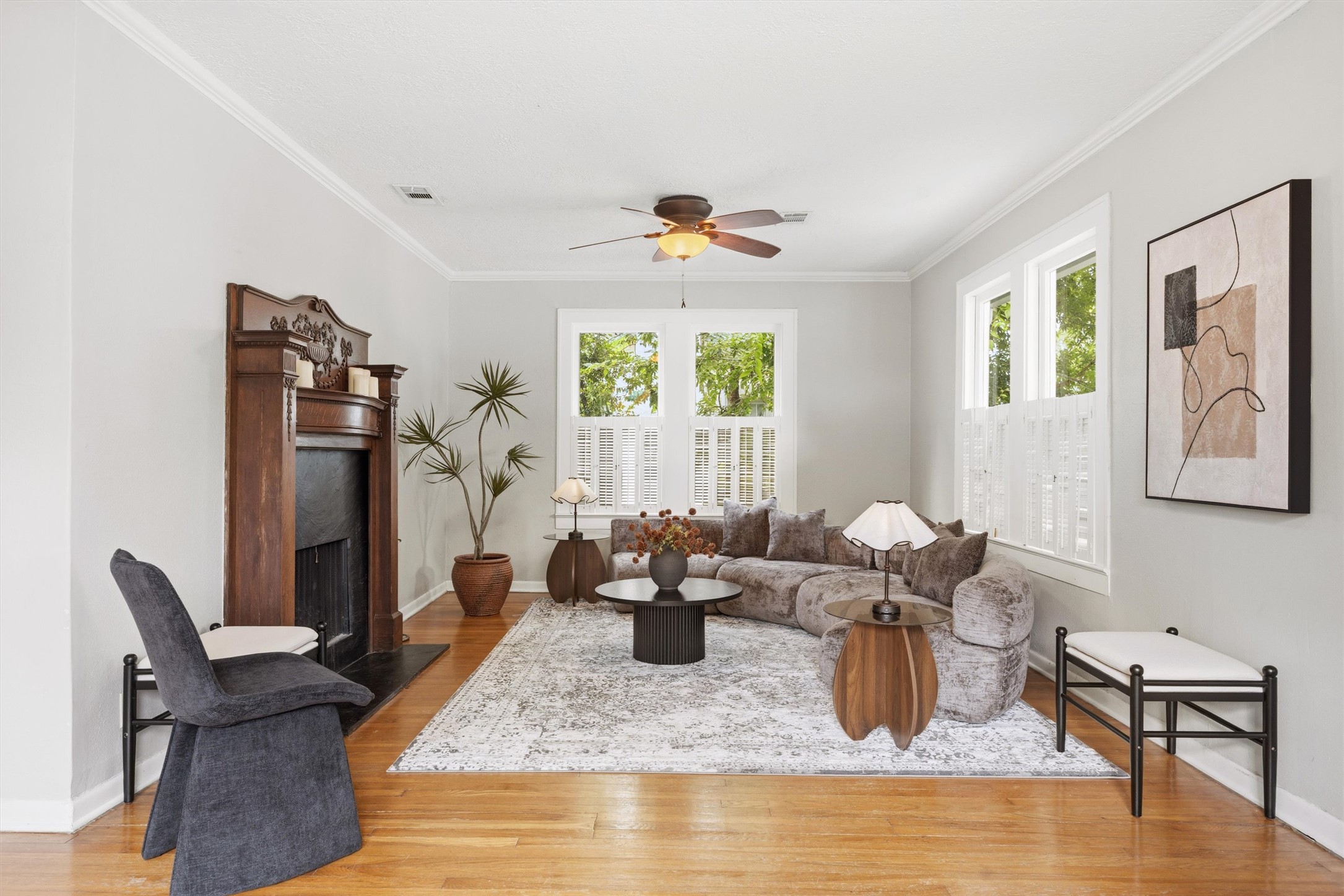 1507 Wethersfield Road Austin, TX 78703 - Photo 5 of 40 a living room with fireplace furniture and a large window