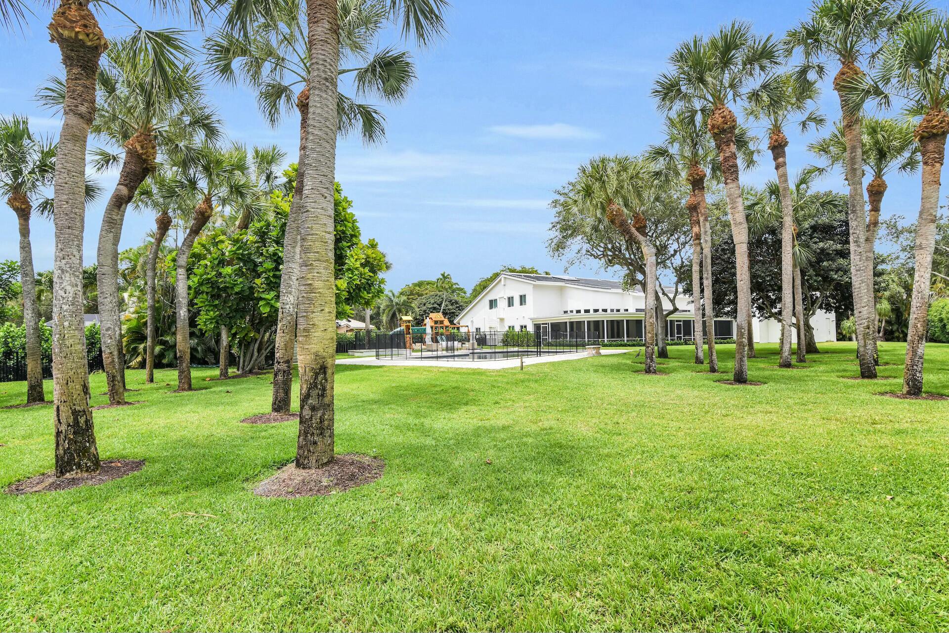 4356 Kasso Circle Boca Raton, FL 33487 - Photo 11 of 72 a view of a house with a yard