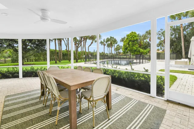 a living room with couch and a window