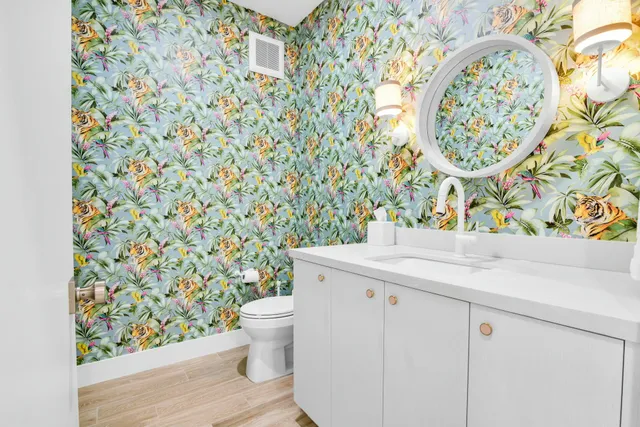 an aerial view of a house with a garden