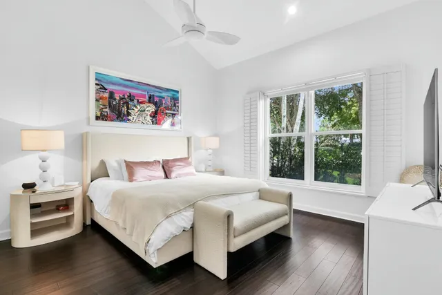 a view of a swimming pool with a yard