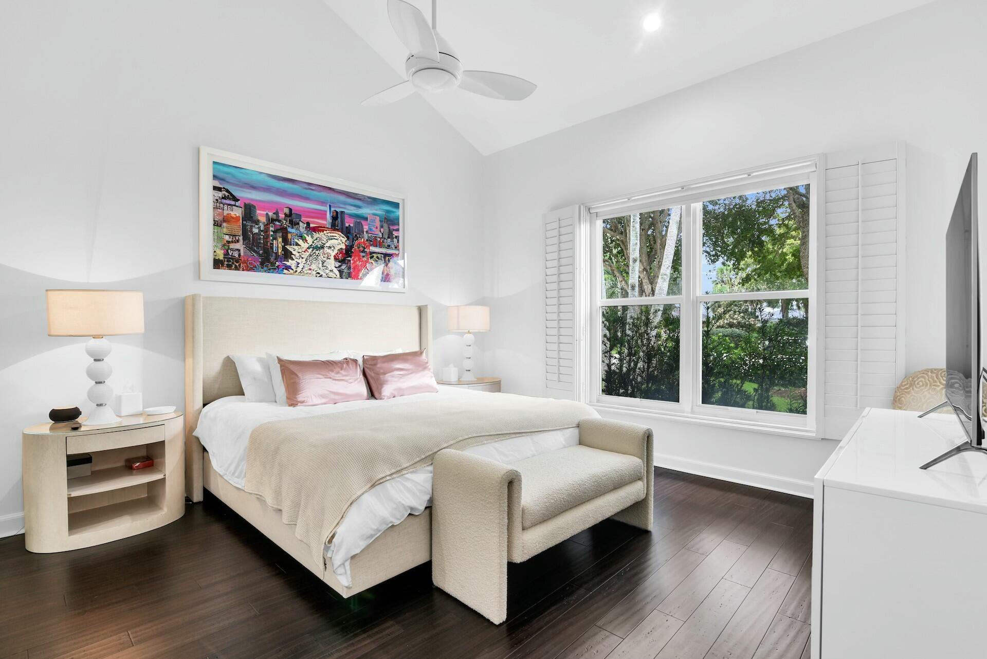 4356 Kasso Circle Boca Raton, FL 33487 - Photo 33 of 72 a bedroom with a bed painting on wall and a large window