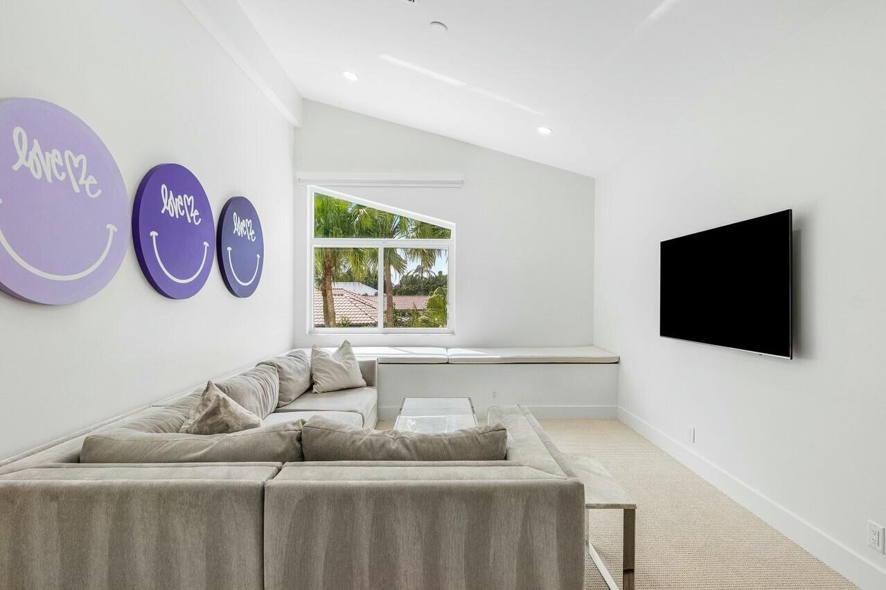 4356 Kasso Circle Boca Raton, FL 33487 - Photo 43 of 72 a living room with furniture and a flat screen tv