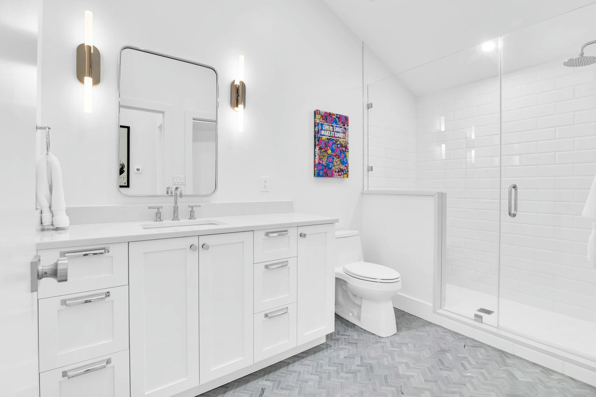 4356 Kasso Circle Boca Raton, FL 33487 - Photo 44 of 72 a bathroom with a sink a toilet and shower