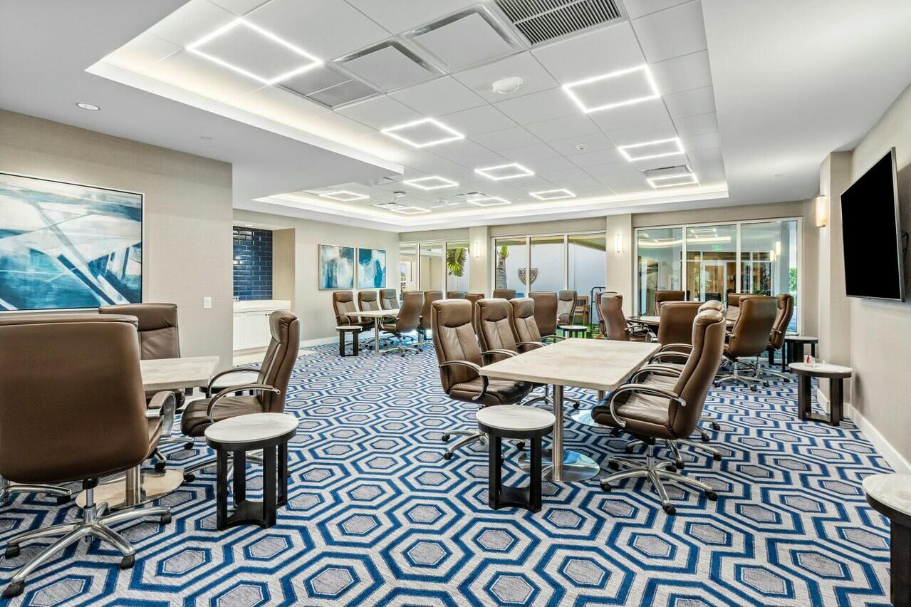 4356 Kasso Circle Boca Raton, FL 33487 - Photo 69 of 72 a living room with furniture and a flat screen tv