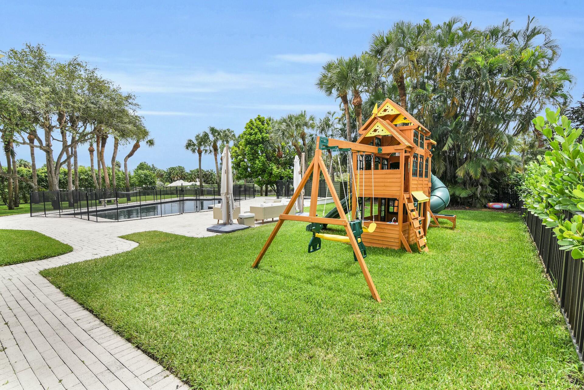 4356 Kasso Circle Boca Raton, FL 33487 - Photo 8 of 72 a view of a park with a slide