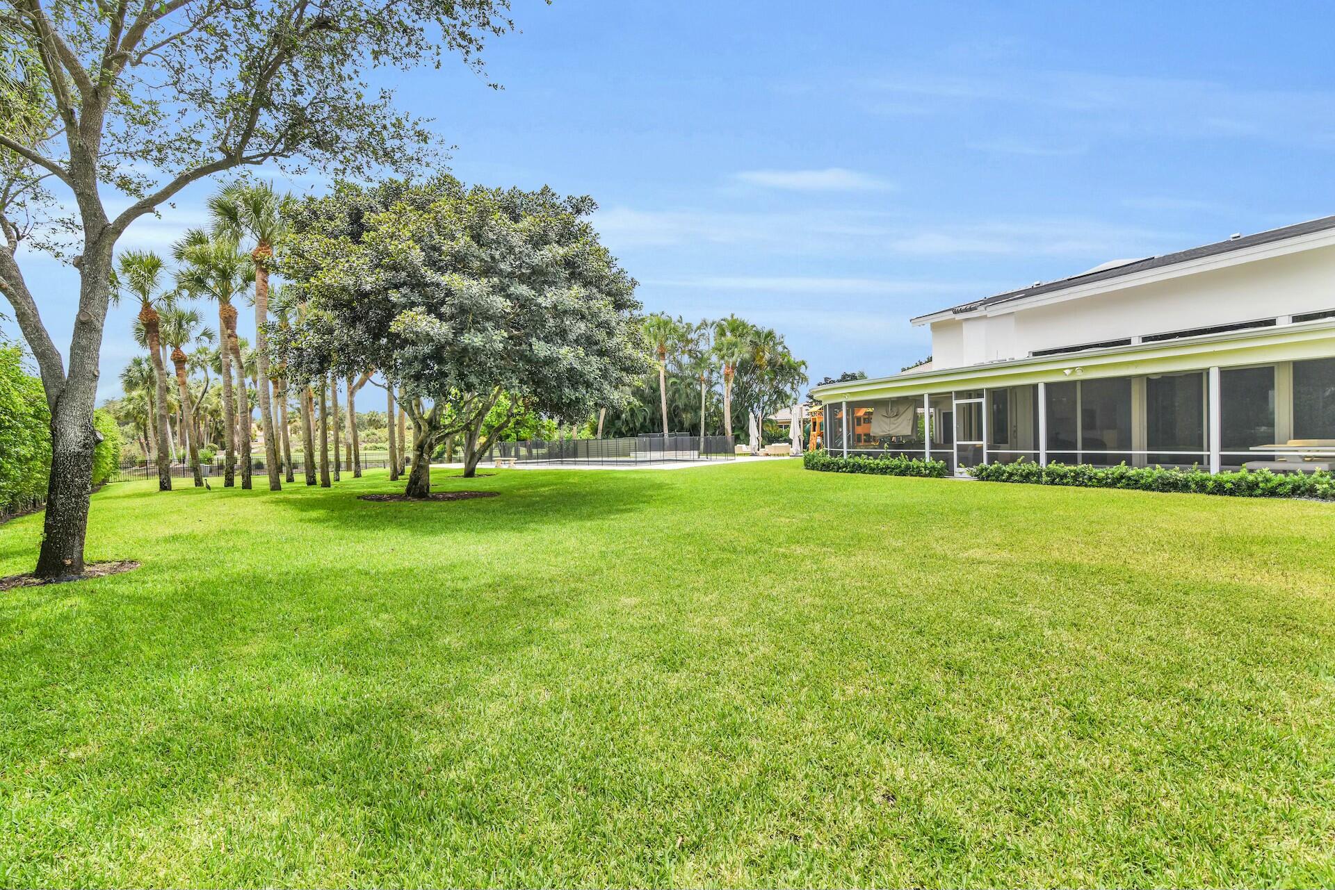 4356 Kasso Circle Boca Raton, FL 33487 - Photo 9 of 72 a view of a house with a big yard