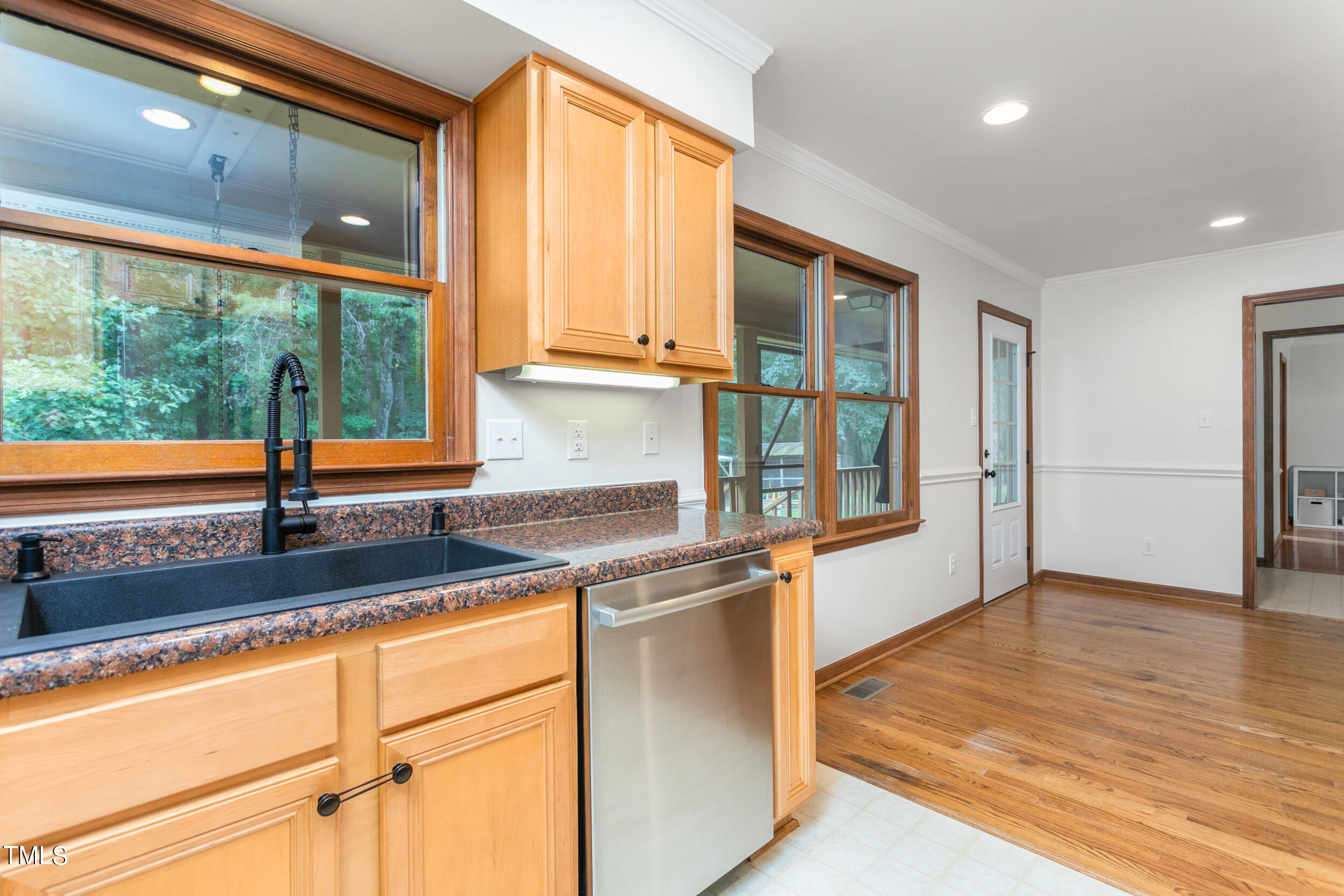 8801 Highway 157 Rougemont, NC 27572 - Photo 11 of 60 a kitchen with stainless steel appliances granite countertop a sink and a cabinets