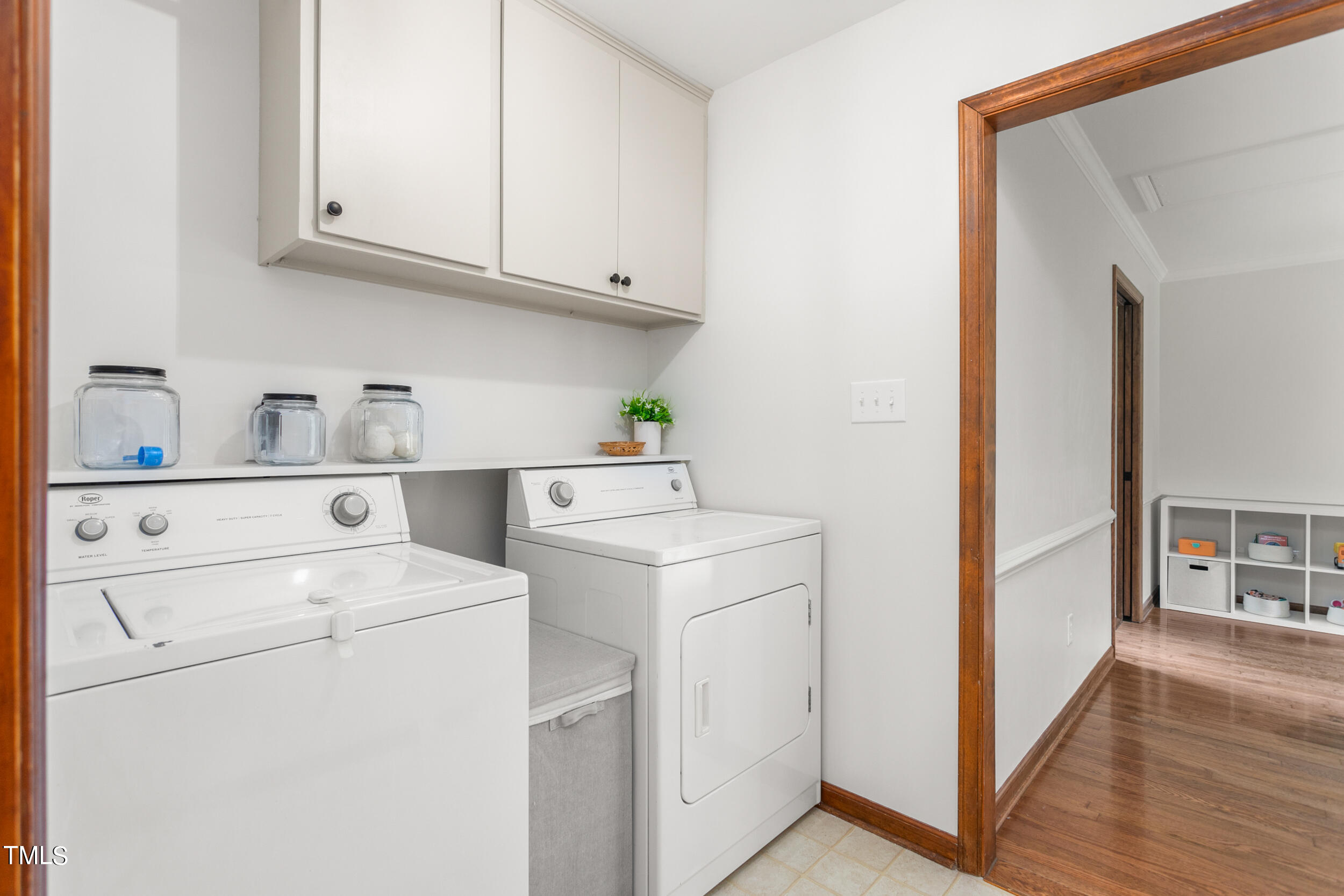 8801 Highway 157 Rougemont, NC 27572 - Photo 13 of 60 a view of storage and utility room with washer and dryer