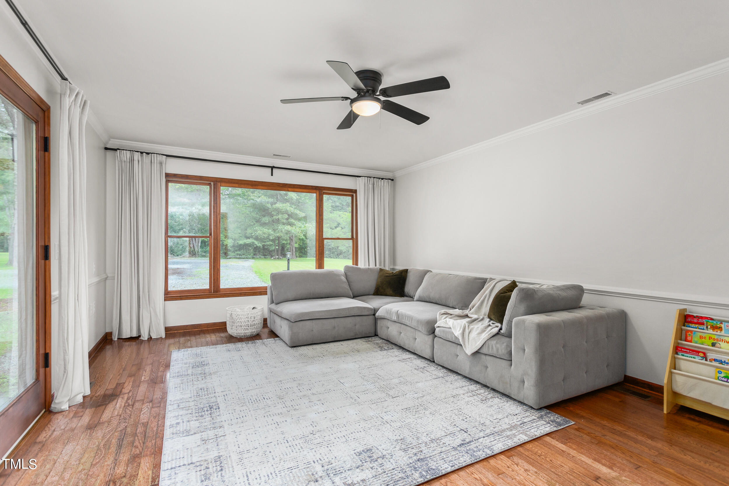 8801 Highway 157 Rougemont, NC 27572 - Photo 15 of 60 a living room with furniture and a large window