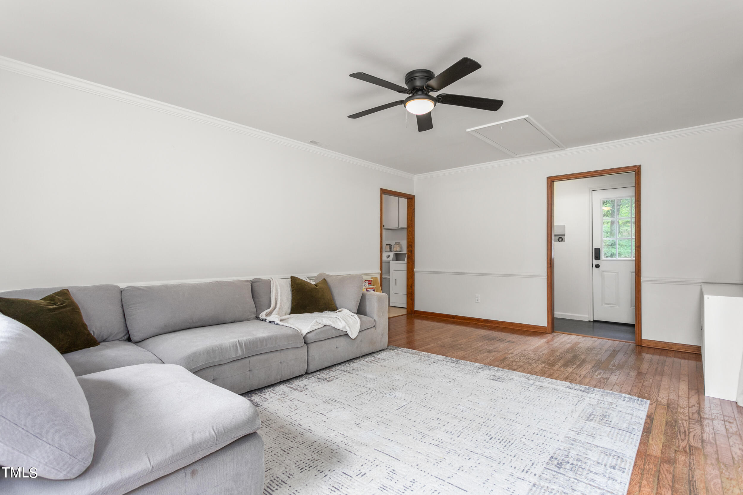 8801 Highway 157 Rougemont, NC 27572 - Photo 16 of 60 a living room with furniture and a ceiling fan