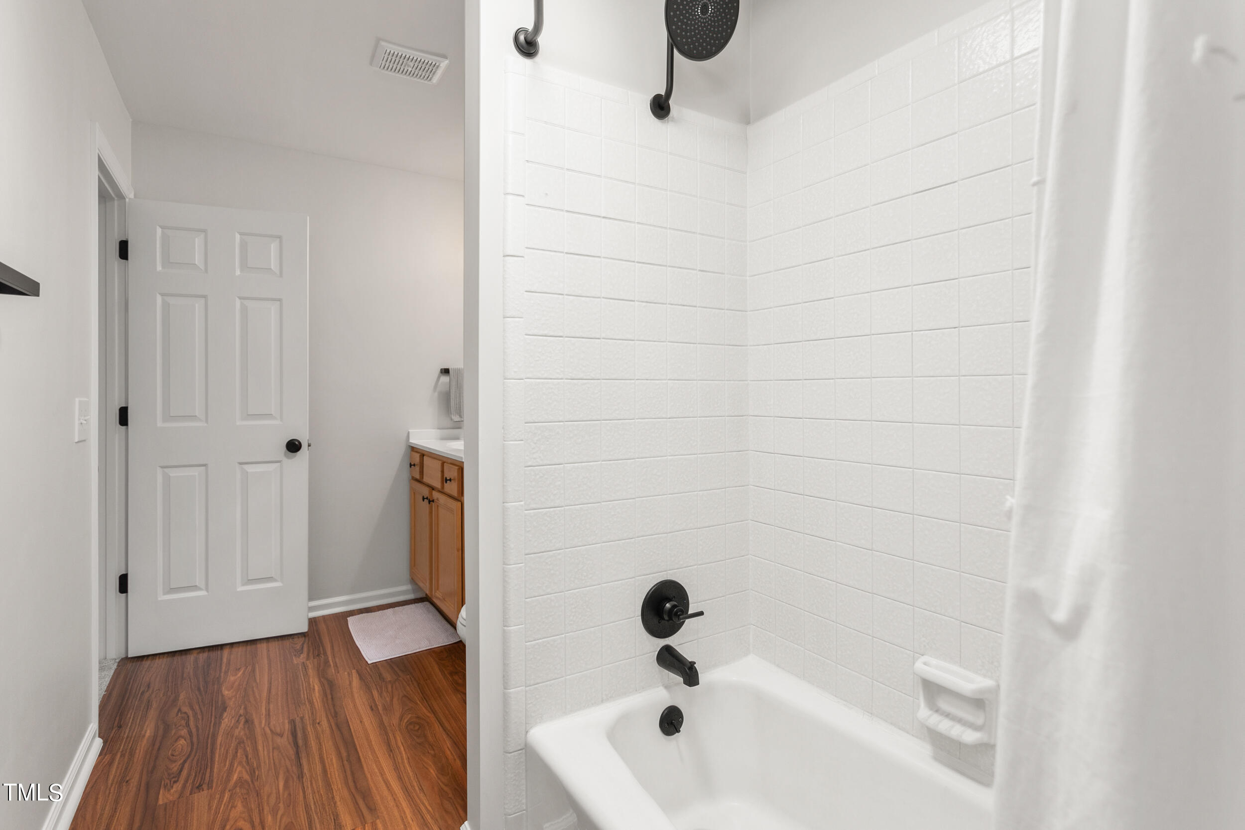 8801 Highway 157 Rougemont, NC 27572 - Photo 27 of 60 a bathroom with a bathtub