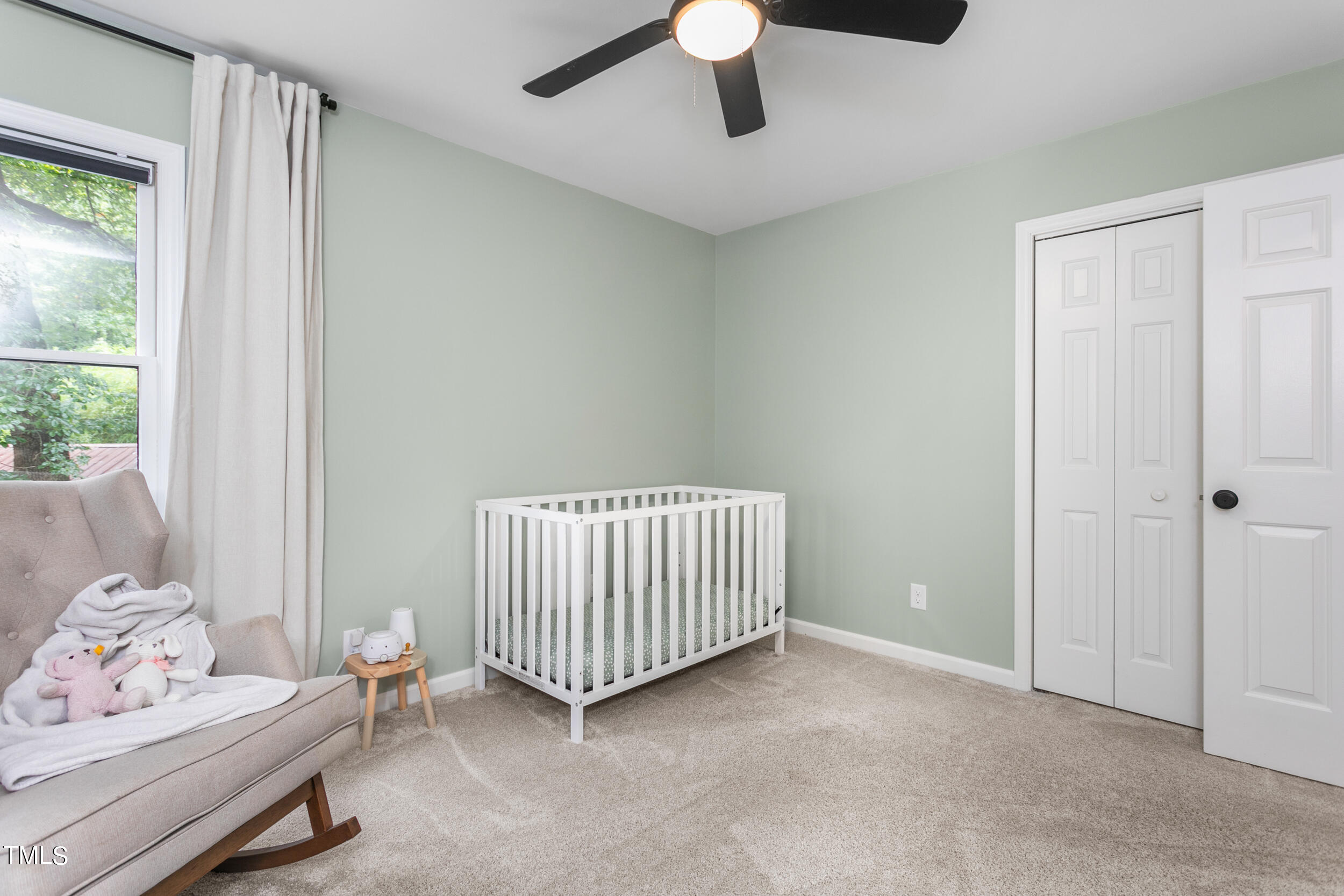 8801 Highway 157 Rougemont, NC 27572 - Photo 32 of 60 a room with a baby bed furniture and a window