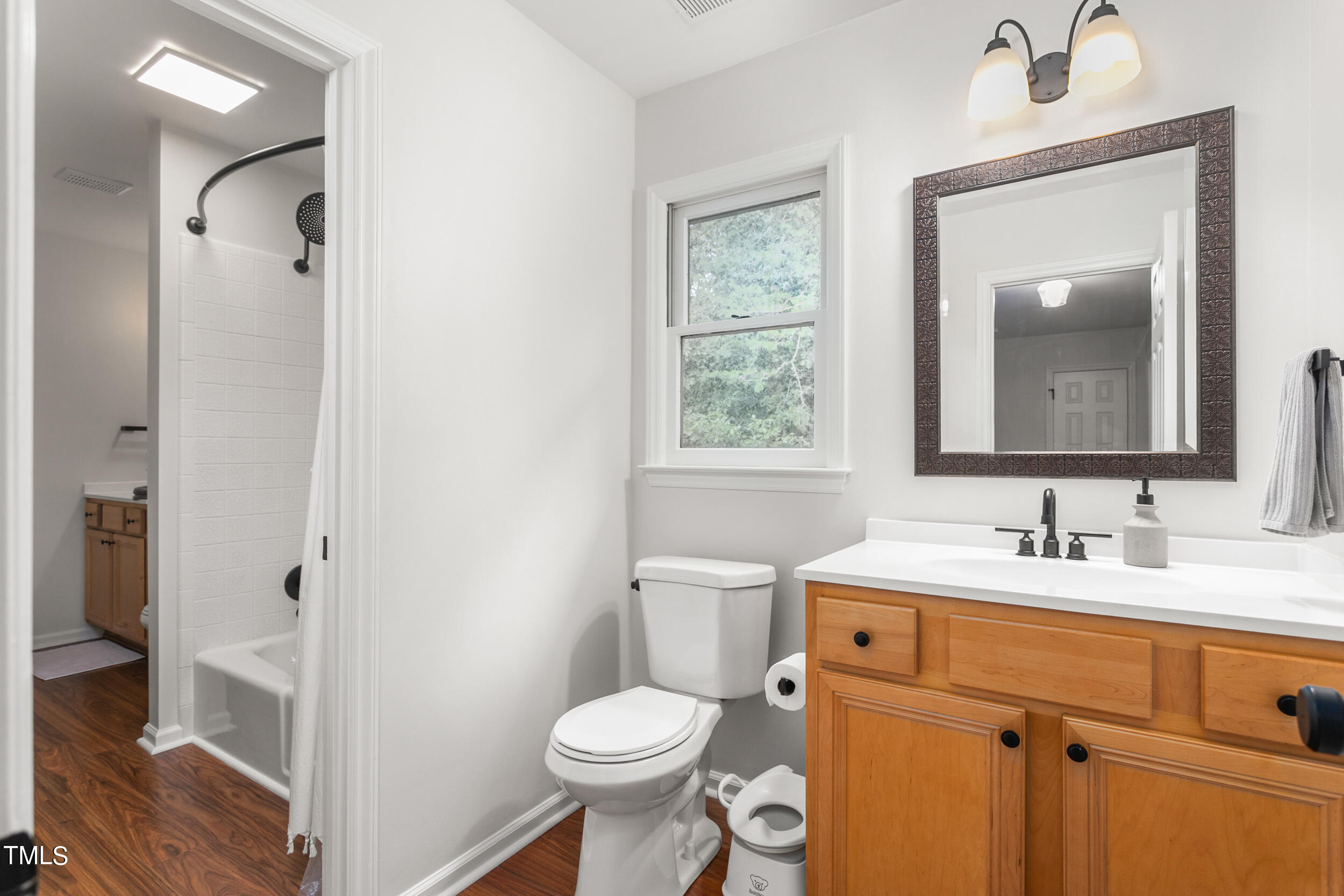 8801 Highway 157 Rougemont, NC 27572 - Photo 33 of 60 a bathroom with a sink toilet and shower